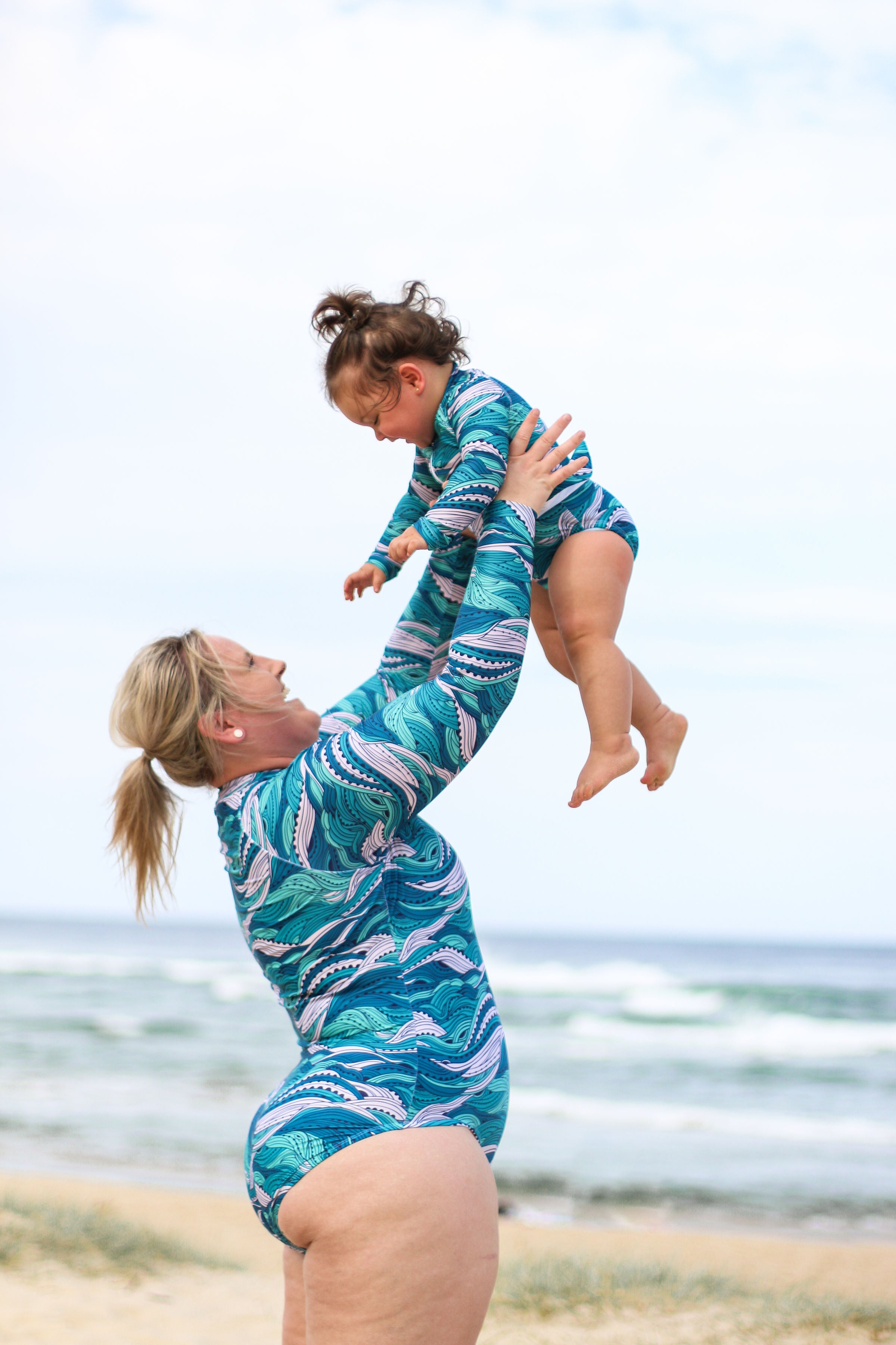 Beach Waves Frill Surfsuit - Kid’s Long Sleeved One Piece Sunsmart and Sustainable Surfsuit